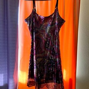 Hot little cocktail/party dress by Wet Seal, purple hued sequins, size large!